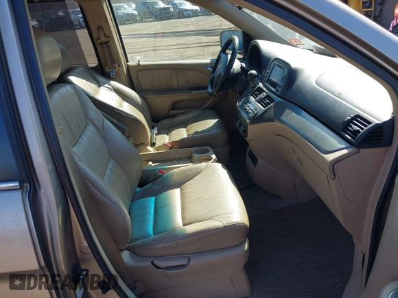 2006 Honda Odyssey EX-L z VIN 5FNRL38736B069969, wystawiony jako IAAI lot #41695311 z przebiegiem 196 218 mil mil oraz . Historia ofert i sprzedaży dostępna na DreamBid. Obrazek 5.