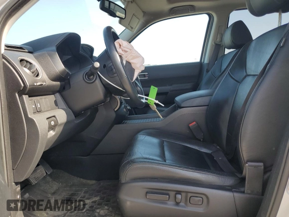 2014 Honda Pilot Touring z VIN 5FNYF4H97EB055677, wystawiony jako Copart lot #55132895 z przebiegiem 83 030 mil mil oraz Szkoda całkowita • Salvage title. Historia ofert i sprzedaży dostępna na DreamBid. Obrazek 7.