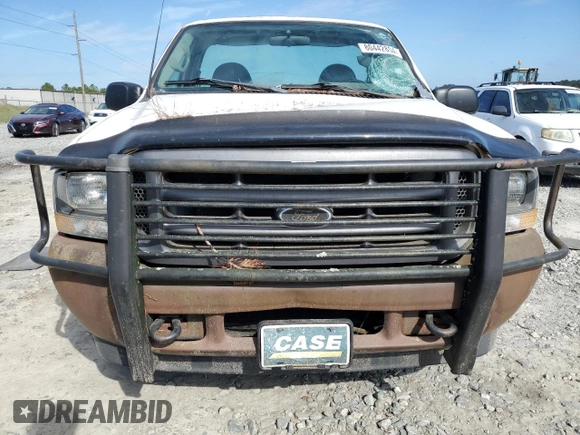 2002 Ford Super Duty F-250 XL with VIN 1FTNF20L22ED69572, listed as a Copart auction lot 80442804 with 218,461 mi miles and Salvage Title. Bid and sale history available at carsss.com. Image 5.