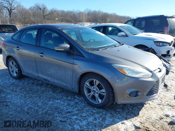 2013 Ford Focus SE z VIN 1FADP3F28DL206541, wystawiony jako IAAI lot #41639697 z przebiegiem 109 828 mil mil oraz . Historia ofert i sprzedaży dostępna na DreamBid. Obrazek 1.