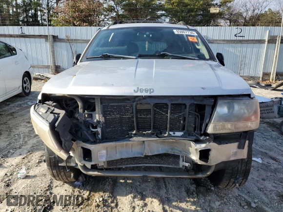 2004 Jeep Grand Cherokee Laredo z VIN 1J4GW48S84C200617, wystawiony jako Copart lot #51732045 z przebiegiem 171 452 mil mil oraz Nie do naprawy • Non repairable. Historia ofert i sprzedaży dostępna na DreamBid. Obrazek 5.