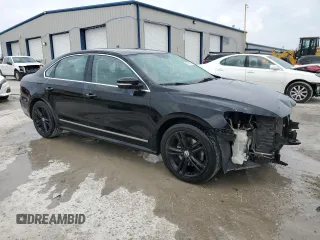 2014 Volkswagen Passat SEL Premium with VIN 1VWCN7A30EC036693, listed as a Copart auction lot 59156245 with 136,939 mi miles and Salvage title. Bid and sale history available at DreamBid. Image 4.