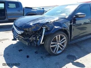 2018 Volkswagen Passat 2.0T S with VIN 1VWAA7A33JC009677, listed as a IAAI auction lot 41796723 with 63,151 mi miles. Bid and sale history available at carsss.com. Image 6.