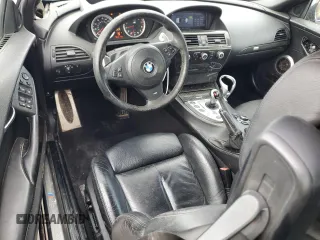 2009 BMW 6 Series M6 z VIN WBSEK93599CY80065, wystawiony jako Copart lot #55277505 z przebiegiem 125 557 mil mil oraz Tytuł czysty. Historia ofert i sprzedaży dostępna na DreamBid. Obrazek 8.