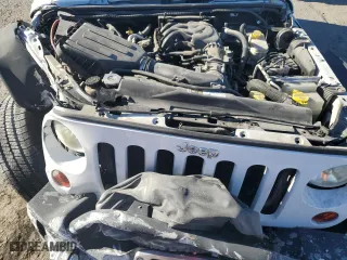 2013 Jeep Wrangler Unlimited Sport with VIN 1C4BJWDG7DL634412, listed as a Copart auction lot 50648545 with 77,014 mi miles and Salvage Title. Bid and sale history available at carsss.com. Image 13.
