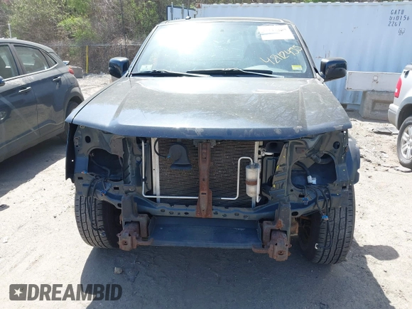 2009 Chevrolet Colorado Work Truck with VIN 1GCDT199498138526, listed as a IAAI auction lot 42112455 with 211,039 mi miles. Bid and sale history available at carsss.com. Image 6.
