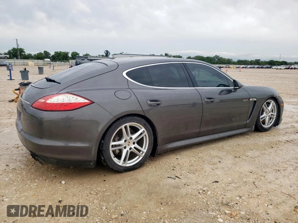 2013 Porsche Panamera S E-Hybrid z VIN WP0AD2A72DL045168, wystawiony jako Copart lot #59136215 z przebiegiem 139 576 mil mil oraz Czysty tytuł • Clean title. Historia ofert i sprzedaży dostępna na DreamBid. Obrazek 3.