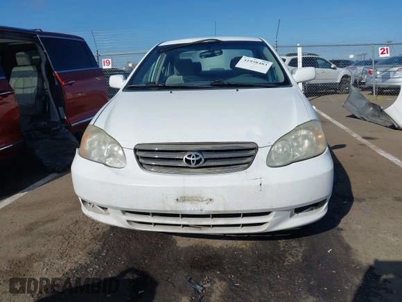 2004 Toyota Corolla CE with VIN JTDBR32E540051928, listed as a IAAI auction lot 41958483 with 299,999 mi miles. Bid and sale history available at carsss.com. Image 13.