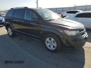 2012 Dodge Journey SXT with VIN 3C4PDCBG2CT321589, listed as a Copart auction lot 58360935 with 215,078 mi miles and Clean title. Bid and sale history available at DreamBid. Image 4.