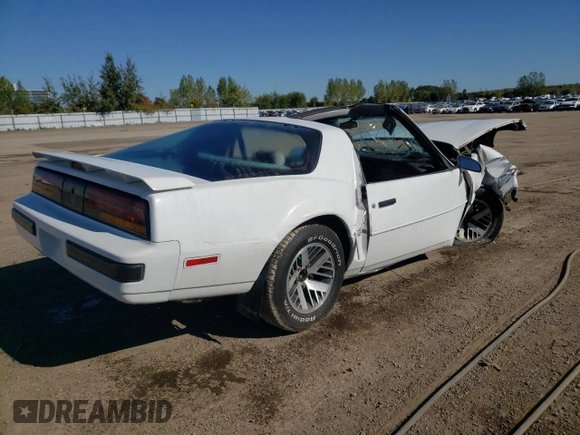 1988 Pontiac Firebird z VIN 1G2FS21S4JL245615, wystawiony jako Copart lot #73486314 z przebiegiem 144 774 mil mil oraz Czysty tytuł • Clean title. Historia ofert i sprzedaży dostępna na DreamBid. Obrazek 3.
