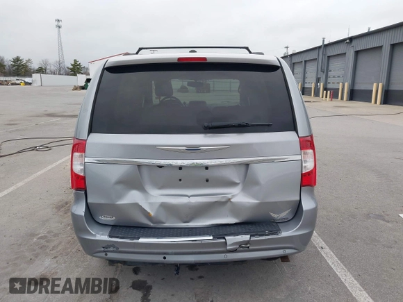 2013 Chrysler Town & Country Touring-L with VIN 2C4RC1CG0DR684329, listed as a IAAI auction lot 41919921 with 101,868 mi miles. Bid and sale history available at carsss.com. Image 16.