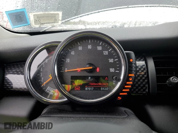 2014 MINI Hardtop S with VIN WMWXM7C54ET985344, listed as a Copart auction lot 52012465 with 87,017 mi miles and Salvage title. Bid and sale history available at DreamBid. Image 9.