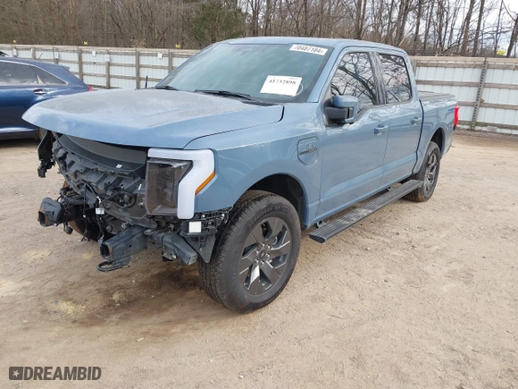 2023 Ford F-150 Lightning Pro with VIN 1FT6W1EVXPWG34958, listed as a IAAI auction lot 41732898 with 10,573 mi miles. Bid and sale history available at carsss.com. Image 19.