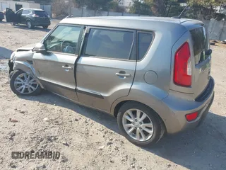 2012 Kia Soul + with VIN KNDJT2A68C7370716, listed as a IAAI auction lot 41726118 with 107,688 mi miles. Bid and sale history available at carsss.com. Image 3.