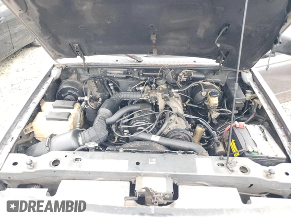 1996 Ford Ranger XL with VIN 1FTCR10A2TUD70395, listed as a Copart auction lot 52977425 with 403,506 mi miles and Non repairable. Bid and sale history available at DreamBid. Image 11.