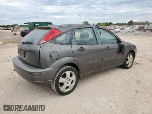 2007 Ford Focus S with VIN 1FAHP37N07W331532, listed as a Copart auction lot 71894104 with 183,909 mi miles and Clean Title. Bid and sale history available at carsss.com. Image 3.
