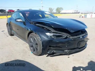 2023 Tesla Model S with VIN 5YJSA1E54PF531021, listed as a IAAI auction lot 42014104 with Not provided miles and . Bid and sale history available at DreamBid. Image 1.