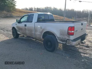 2005 Ford F-150 STX with VIN 1FTRX14W15NB34372, listed as a IAAI auction lot 41660412 with 104,086 mi miles. Bid and sale history available at carsss.com. Image 3.