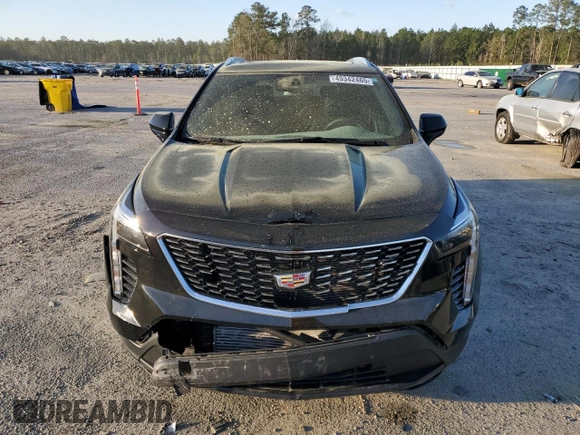 2023 Cadillac XT4 FWD Luxury with VIN 1GYAZAR49PF102307, listed as a Copart auction lot 49342465 with 21,093 mi miles and Salvage Title. Bid and sale history available at DreamBid. Image 5.