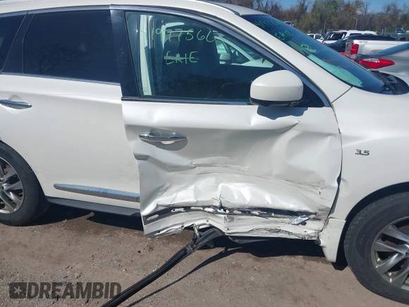 2015 Infiniti QX60 with VIN 5N1AL0MM0FC504172, listed as a IAAI auction lot 41977566 with 128,196 mi miles and . Bid and sale history available at DreamBid. Image 6.