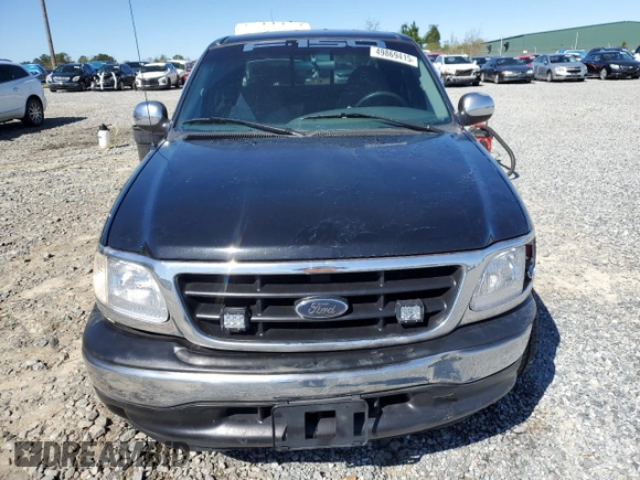 2001 Ford F-150 XLT with VIN 1FTRW07W11KE08545, listed as a Copart auction lot 49869415 with 264,349 mi miles and Salvage title. Bid and sale history available at DreamBid. Image 5.