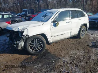 2021 Jeep Grand Cherokee 80th Anniversary with VIN 1C4RJFBG5MC620428, listed as a IAAI auction lot 41330326 with 33,277 mi miles and . Bid and sale history available at DreamBid. Image 16.