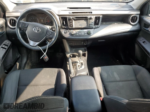 2018 Toyota RAV4 XLE with VIN 2T3RFREV0JW765995, listed as a Copart auction lot 63968785 with 114,598 mi miles and Salvage title. Bid and sale history available at DreamBid. Image 8.