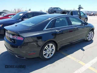 2014 Lincoln MKZ Hybrid z VIN 3LN6L2LU2ER830378, wystawiony jako IAAI lot #42207921 z przebiegiem 155 304 mil mil oraz . Historia ofert i sprzedaży dostępna na DreamBid. Obrazek 4.