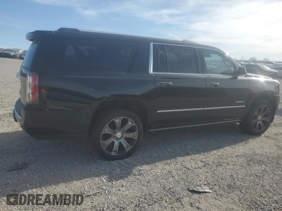 2015 GMC Yukon XL Denali with VIN 1GKS2JKJXFR527843, listed as a Copart auction lot 54159785 with 128,603 mi miles and Clean Title. Bid and sale history available at carsss.com. Image 4.