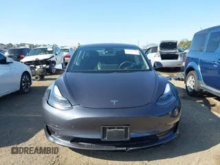 2023 Tesla Model 3 with VIN 5YJ3E1EA7PF447409, listed as a IAAI auction lot 41965416 with 40,033 mi miles and . Bid and sale history available at DreamBid. Image 12.
