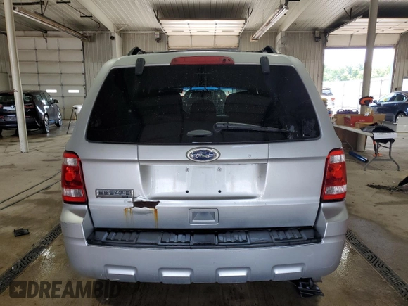 2012 Ford Escape XLT with VIN 1FMCU9D75CKC35544, listed as a Copart auction lot 65014435 with 135,740 mi miles and Salvage title. Bid and sale history available at DreamBid. Image 6.