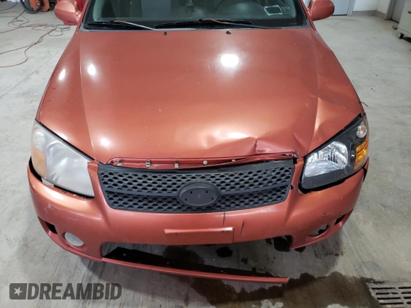 2007 Kia Spectra with VIN KNAFE161775008415, listed as a Copart auction lot 76591404 with 221,117 mi miles and Clean Title. Bid and sale history available at carsss.com. Image 12.