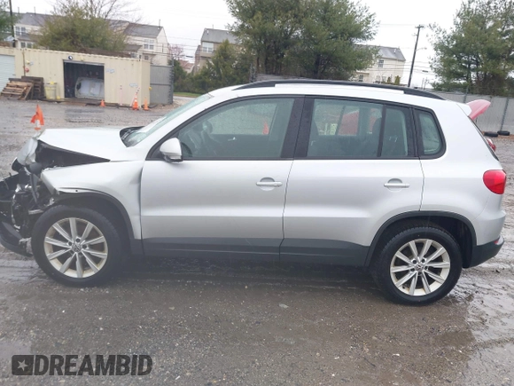 2017 Volkswagen Tiguan S with VIN WVGBV7AX4HK051172, listed as a IAAI auction lot 41843182 with 160,010 mi miles and . Bid and sale history available at DreamBid. Image 15.
