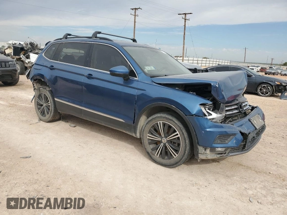 2019 Volkswagen Tiguan with VIN 3VVHP65N3KM053878, listed as a Copart auction lot 71412654 with 68,189 mi miles and Salvage title. Bid and sale history available at DreamBid. Image 4.