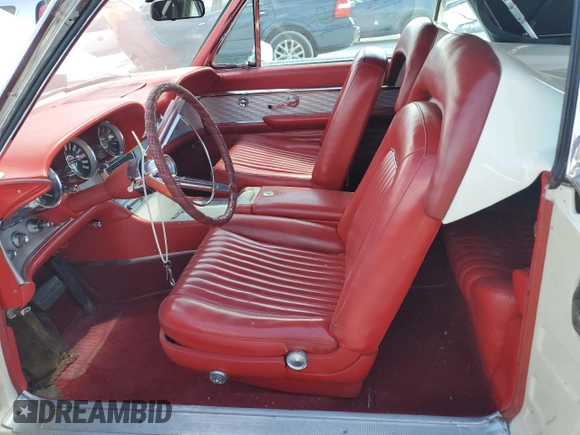 1961 Ford Thunderbird with VIN 1Y73Z112797, listed as a Copart auction lot 77574894 with 22,246 mi miles and Salvage Title. Bid and sale history available at DreamBid. Image 7.