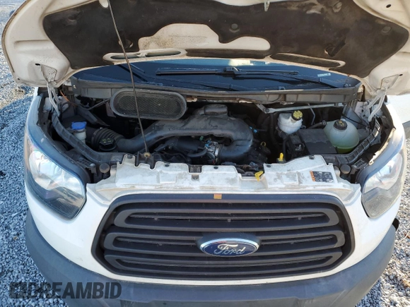 2018 Ford Transit с VIN 1FTYE2CM8JKA25507, выставлен на аукционе Copart как лот 78298193 с пробегом 167 425 миль миль и Списание • Salvage title. История ставок и продаж доступна на DreamBid. Изображение 13.