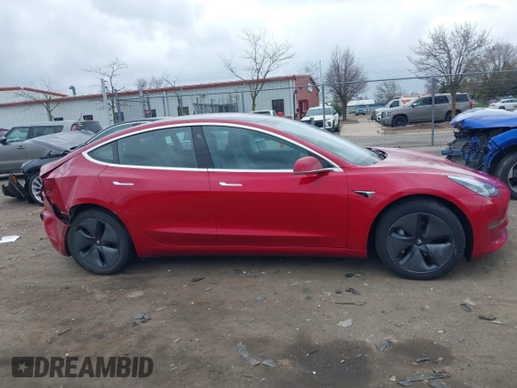 2018 Tesla Model 3 Long Range Battery with VIN 5YJ3E1EB3JF129772, listed as a IAAI auction lot 42017305 with 103,825 mi miles and . Bid and sale history available at DreamBid. Image 12.