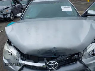 2015 Toyota Camry XLE with VIN 4T4BF1FK1FR468666, listed as a IAAI auction lot 42005934 with 124,173 mi miles and . Bid and sale history available at DreamBid. Image 10.