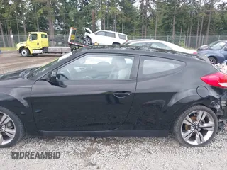 2012 Hyundai Veloster w/Gray Int with VIN KMHTC6AD4CU062034, listed as a IAAI auction lot 42371790 with 116,861 mi miles and . Bid and sale history available at DreamBid. Image 14.
