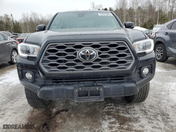 2023 Toyota Tacoma 4WD SR with VIN 3TYCZ5AN8PT128167, listed as a Copart auction lot 46230135 with 58,976 mi miles and Clean Title. Bid and sale history available at carsss.com. Image 5.