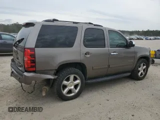 2011 Chevrolet Tahoe LS with VIN 1GNSCAE09BR138852, listed as a Copart auction lot 49165595 with 207,548 mi miles and Salvage title. Bid and sale history available at DreamBid. Image 3.