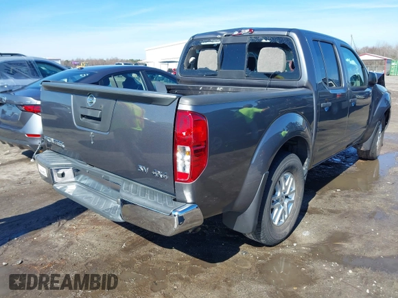 2021 Nissan Frontier SV z VIN 1N6ED0EBXMN721100, wystawiony jako IAAI lot #41585852 z przebiegiem 50 919 mil mil oraz . Historia ofert i sprzedaży dostępna na DreamBid. Obrazek 4.