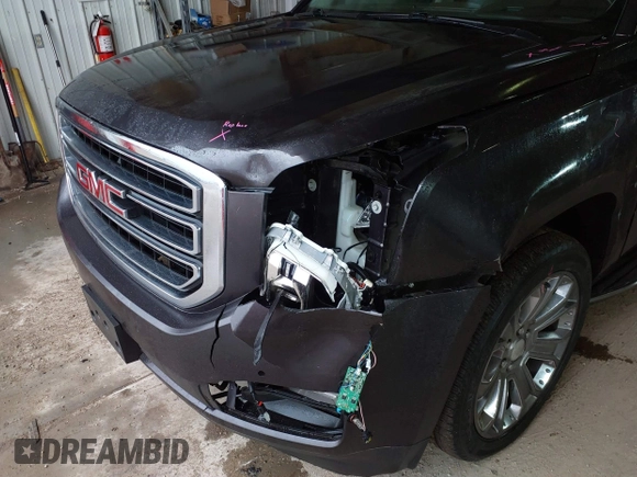 2015 GMC Yukon XL SLT with VIN 1GKS2HKC6FR667110, listed as a IAAI auction lot 41472250 with 141,383 mi miles. Bid and sale history available at carsss.com. Image 6.