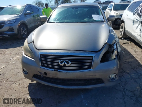 2012 Infiniti M with VIN JN1BY1AP3CM331819, listed as a IAAI auction lot 41773311 with 321,644 mi miles and . Bid and sale history available at DreamBid. Image 6.