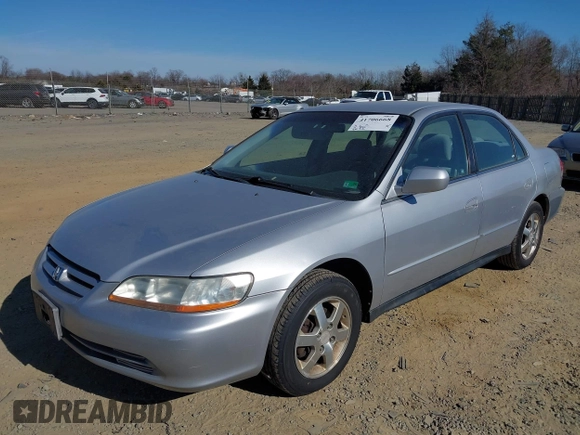 2002 Honda Accord EX z VIN 1HGCG56542A144609, wystawiony jako IAAI lot #41706668 z przebiegiem 220 536 mil mil oraz . Historia ofert i sprzedaży dostępna na DreamBid. Obrazek 2.