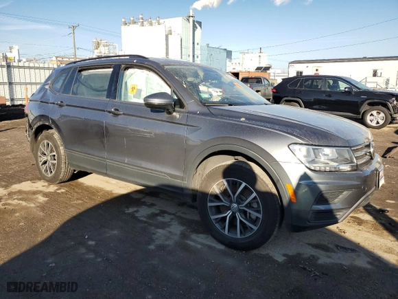 2021 Volkswagen Tiguan S with VIN 3VV0B7AX7MM135897, listed as a Copart auction lot 84140564 with 0 mi miles and Salvage Title. Bid and sale history available at carsss.com. Image 4.
