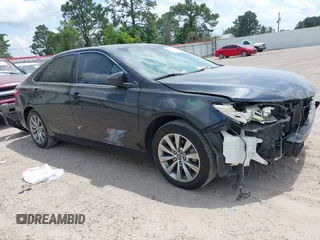 2015 Toyota Camry XLE with VIN 4T1BF1FKXFU881017, listed as a IAAI auction lot 42054825 with 122,232 mi miles and . Bid and sale history available at DreamBid. Image 1.