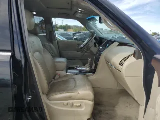 2012 Infiniti QX56 7-passenger with VIN JN8AZ2NE1C9016500, listed as a Copart auction lot 74600284 with 145,656 mi miles and Salvage Title. Bid and sale history available at carsss.com. Image 7.