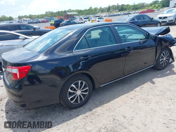 2014 Toyota Camry L with VIN 4T4BF1FKXER402857, listed as a IAAI auction lot 42144757 with 192,081 mi miles and . Bid and sale history available at DreamBid. Image 4.