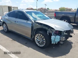 2021 Lexus ES 300h Luxury with VIN 58AEA1C15MU008479, listed as a IAAI auction lot 42638671 with 44,845 mi miles and . Bid and sale history available at DreamBid. Image 1.